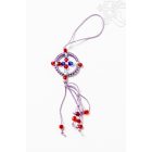 Dharma lógó gyöngyökkel